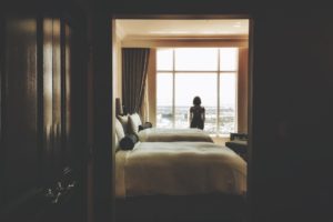 Women standing in hotel room