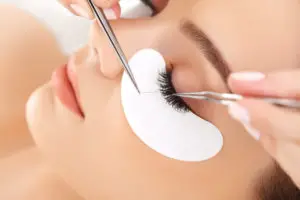Image of lady getting eyelash extensions