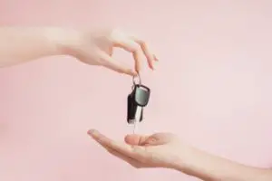 handing keys over - 10 reasons not to lease a car