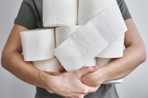 person holding toilet paper - 3rd stimulus check