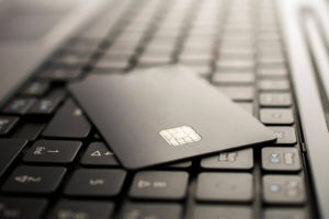 black credit card on a black keyboard